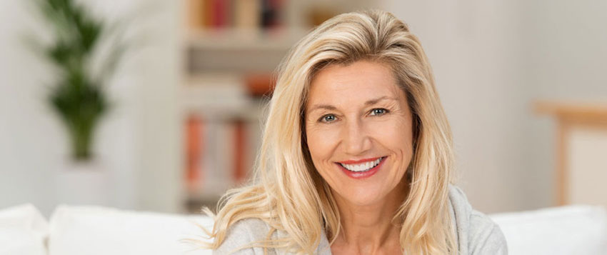 Woman smiling with dentures